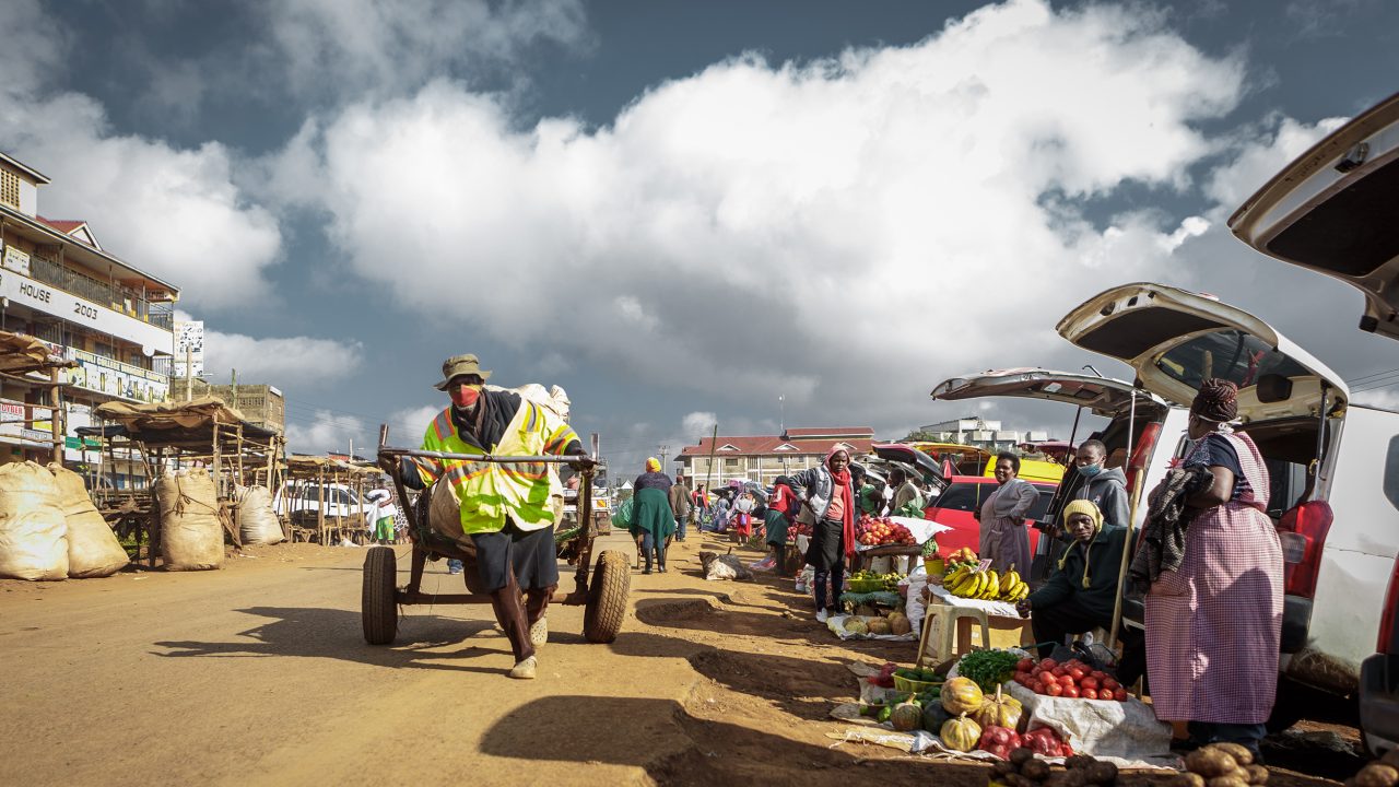 A cart puller at work at Wangige Market in Kiambu, Kenya