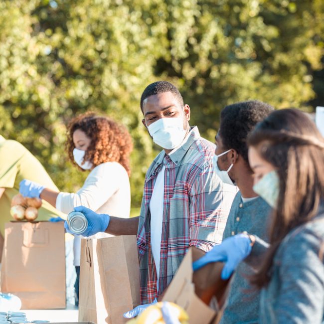 Community food bank volunteers working during COVID-19 crisis
