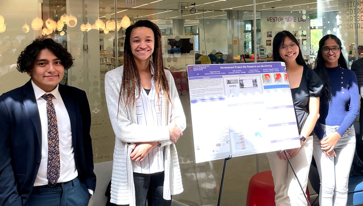 UChicago DSSI Summer Program participants Salvador Tranquilino-Ramos of University of Illinois Chicago, UChicago Software Engineer and project mentor Launa Greer, Halli Lacanlale of University of Illinois Chicago, and Gagandeep Kaur of Fresno State present their research conducted during the summer. 
